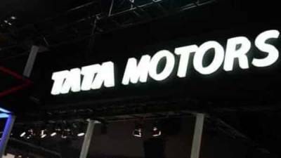Tata Motors reaffirms plan to turn debt-free by FY 24 despite negative impact of Covid pandemic - livemint.com - India