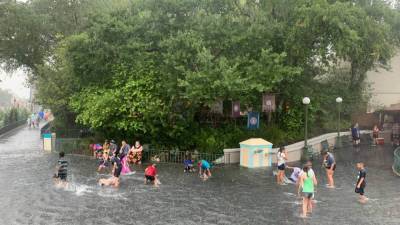 PHOTOS: Kids swim in flooded streets at Disney's Magic Kingdom - fox29.com - county Chase
