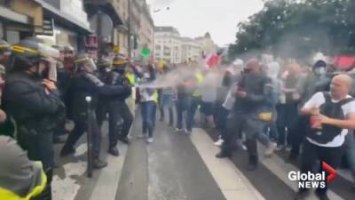 COVID-19: Thousands stage Paris protest against Macron’s health pass, police present - globalnews.ca - France - city Paris