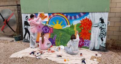 Falkirk's young people design and create mural representing 'opening curtain' on Covid-19 - dailyrecord.co.uk