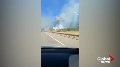 Fast moving grassfire shuts down part of Trans-Canada Hwy in Alberta - globalnews.ca - Canada