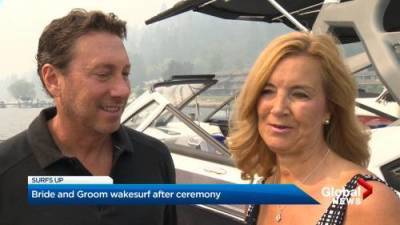Sydney Morton - Bride and Groom wakesurf after ceremony - globalnews.ca
