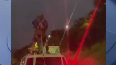 Joyriding man chained to top of Escalade in latest viral Detroit freeway video - fox29.com - city Detroit - city Motor
