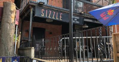 9 COVID-19 cases linked to outbreak at Sizzle night club in Hamilton - globalnews.ca - county Hamilton