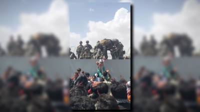 US troops pull infant over barbed wire-topped wall at Kabul airport - fox29.com - Usa - Afghanistan - Vietnam - city Kabul, Afghanistan
