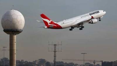 Qantas Airways idles 2,500 more staff as COVID-19 cuts domestic flights - livemint.com - India