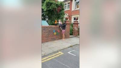 Children recreate Olympic torch relay in UK streets - fox29.com - Britain