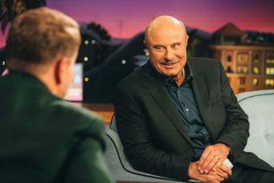 James Corden - Phil Macgraw - Dr. Phil Slams COVID-19 Vaccine Conspiracy Theories: ‘Are You F**king Kidding Me?’ - etcanada.com