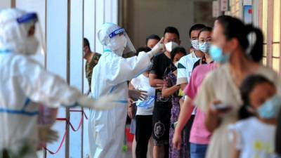 China battling new Covid-19 outbreak among schoolchildren - rte.ie - China - Singapore - province Fujian