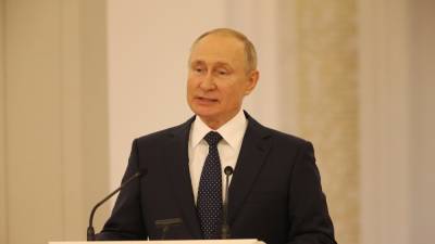 Vladimir Putin - Putin self-isolates after Covid-19 detected in entourage - rte.ie - Russia - Afghanistan - Tajikistan