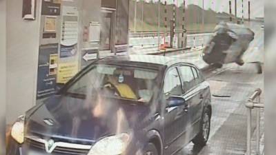 Video shows 'drug driver' crash into toll booth, car, UK police say - fox29.com - Britain