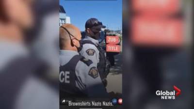 Dawson Creek RCMP yelled at by protesters as they arrest man outside city hall - globalnews.ca - Germany