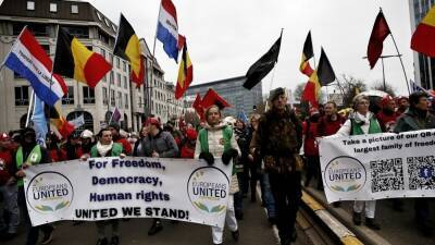 Thousands protest in Belgium against Covid rules - rte.ie - France - Eu - Poland - Belgium - Romania - county Alexander - city Brussels, Belgium