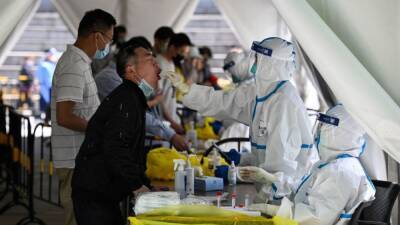 Beijing enforces lockdowns, expands COVID-19 mass testing amid outbreak - fox29.com - China - city Beijing - city Shanghai