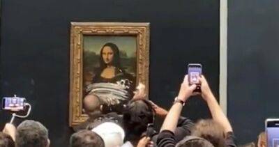 Mona Lisa - Leonardo Da-Vinci - Man in disguise throws cake at Mona Lisa painting in Louvre Museum - globalnews.ca - Italy