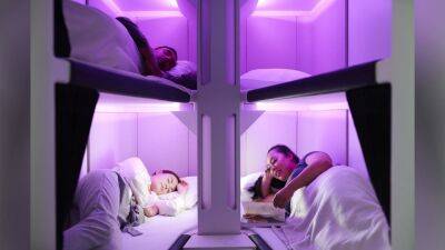 Airline to debut next-level sleeping pods for economy class flights - fox29.com - New Zealand