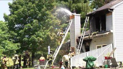 Joann Pileggi - Firefighters rescue man trapped on roof of Bucks County condo fire - fox29.com - county Bucks - city Newtown