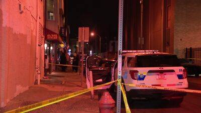 Police: Woman hit by stray bullet after security guard shoots attacker inside Chinatown hookah bar - fox29.com - city Chinatown