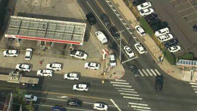 Philadelphia police: Car with two kids inside ambushed at gas station, killing man and injuring boy - fox29.com