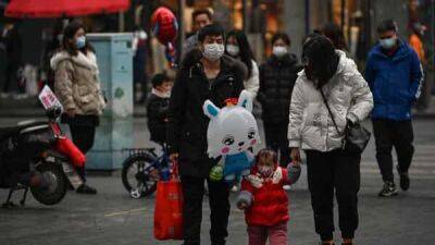 China says Covid outbreak has infected 80% of population - livemint.com - China - India