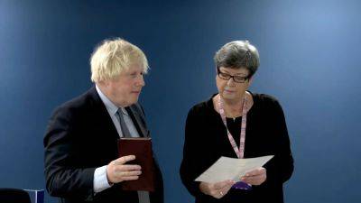 Boris Johnson - Johnson apologises to Covid victims' families but defends record - rte.ie - China - Italy - Britain