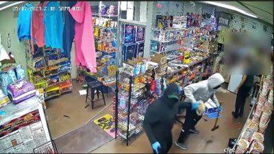 Video: Ax-wielding suspects break into North Philly store during gunpoint robbery - fox29.com