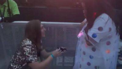Watch: Man surprises girlfriend by proposing at Taylor Swift concert - fox29.com - area District Of Columbia - state Massachusets - Washington, area District Of Columbia