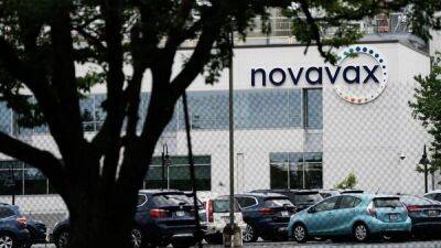 COVID-19 vaccine maker Novavax to slash quarter of global workforce; shares surge over higher-than-expected revenue - livemint.com - Usa - India