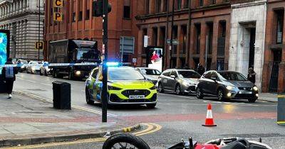 Motorcyclist suffers leg and arm injuries after serious crash with 4x4 closes city centre road - manchestereveningnews.co.uk - city Manchester