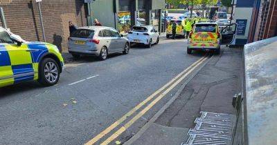 A.Greater - Police scene in place outside McDonald's as air ambulance called - manchestereveningnews.co.uk - city Manchester