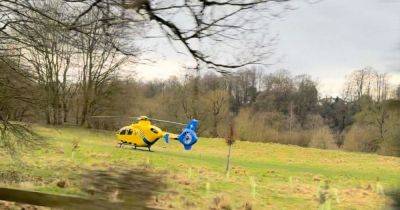 Air ambulance lands in park after cyclist seriously hurt in crash - manchestereveningnews.co.uk