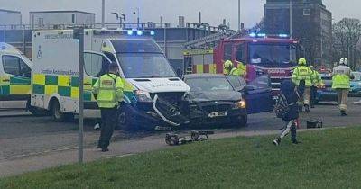 Woman trapped in car after crash with ambulance carrying patient near hospital - dailyrecord.co.uk - Scotland