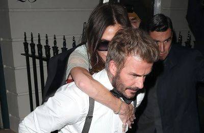David Beckham - David Beckham Gives Victoria a Piggyback Ride Out of Her Birthday Party to Avoid Using Crutches (Photos) - justjared.com - city London - Victoria, county Beckham - county Beckham