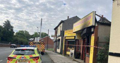 Emergency services descend on fireplace shop after blaze breaks out with cordon in place - manchestereveningnews.co.uk - city Manchester